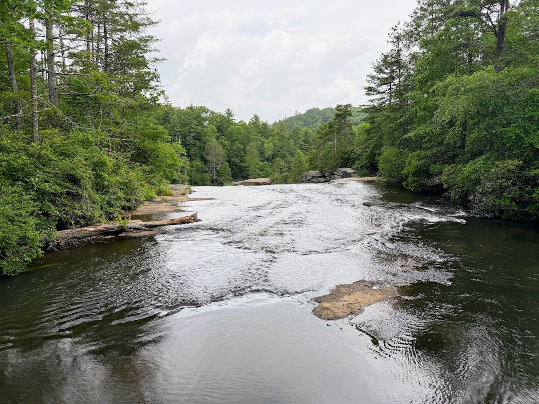 The Little River flowing toward the top of High Falls seen from the covered bridge